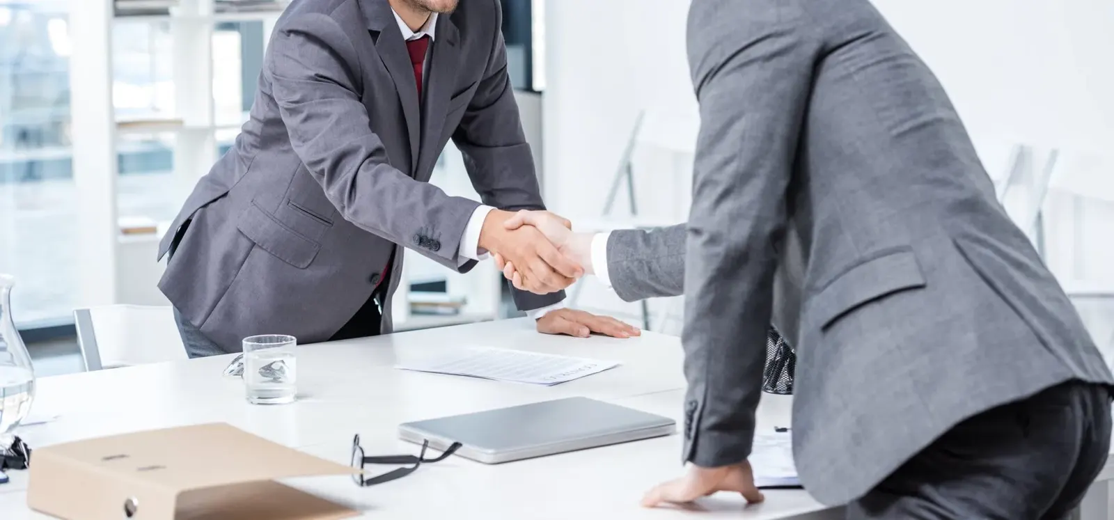 Business owners reviewing an agreement together